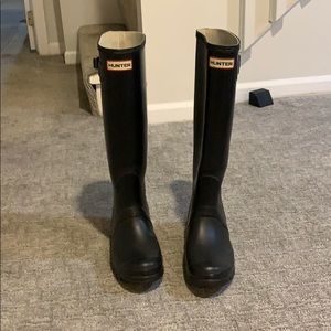 Tall, black Hunter rain boots